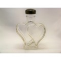 Glass bottle formed of two intertwined hearts