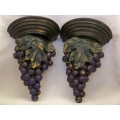 Pair of wall brackets or appliques with bunches of grapes