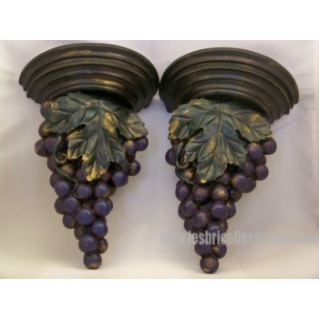 Pair of wall brackets or appliques with bunches of grapes